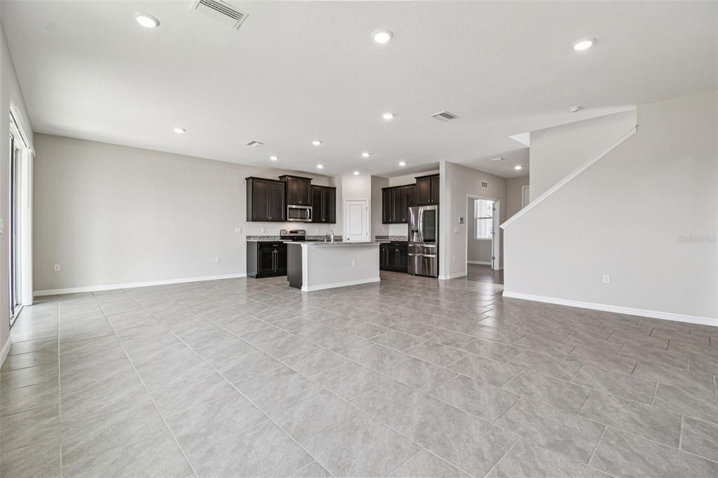 3827 Sunny Spring Street Plant City, FL 33565 - Photo 16 of 57 a view of kitchen and refrigerator