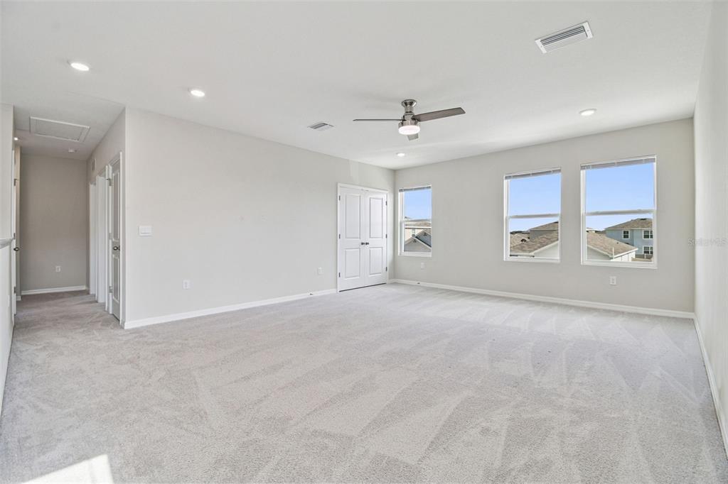 3827 Sunny Spring Street Plant City, FL 33565 - Photo 22 of 57 a view of an empty room with a window