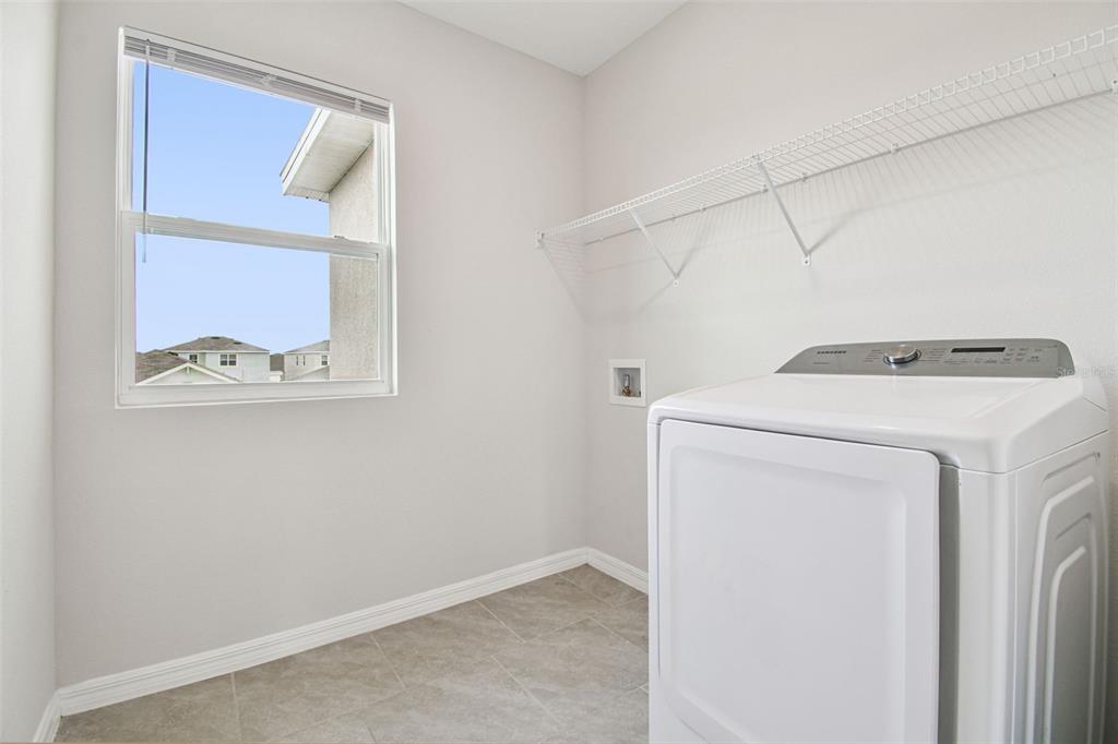 3827 Sunny Spring Street Plant City, FL 33565 - Photo 27 of 57 a utility room with dryer and washer