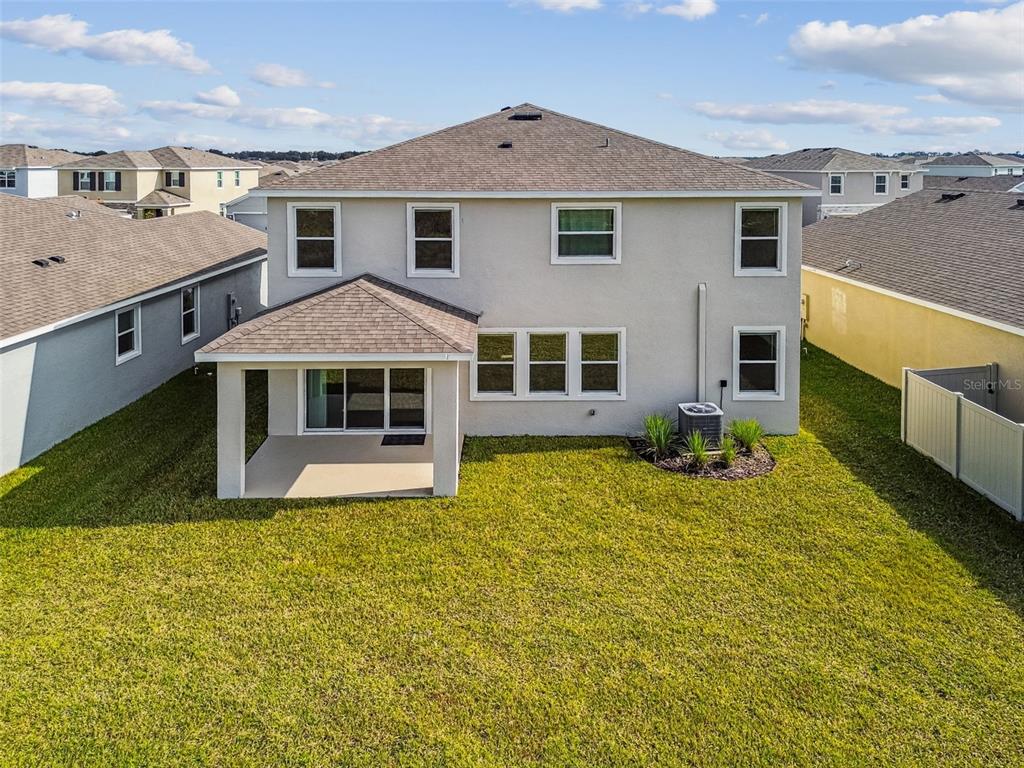 3827 Sunny Spring Street Plant City, FL 33565 - Photo 40 of 57 a front view of a house with yard