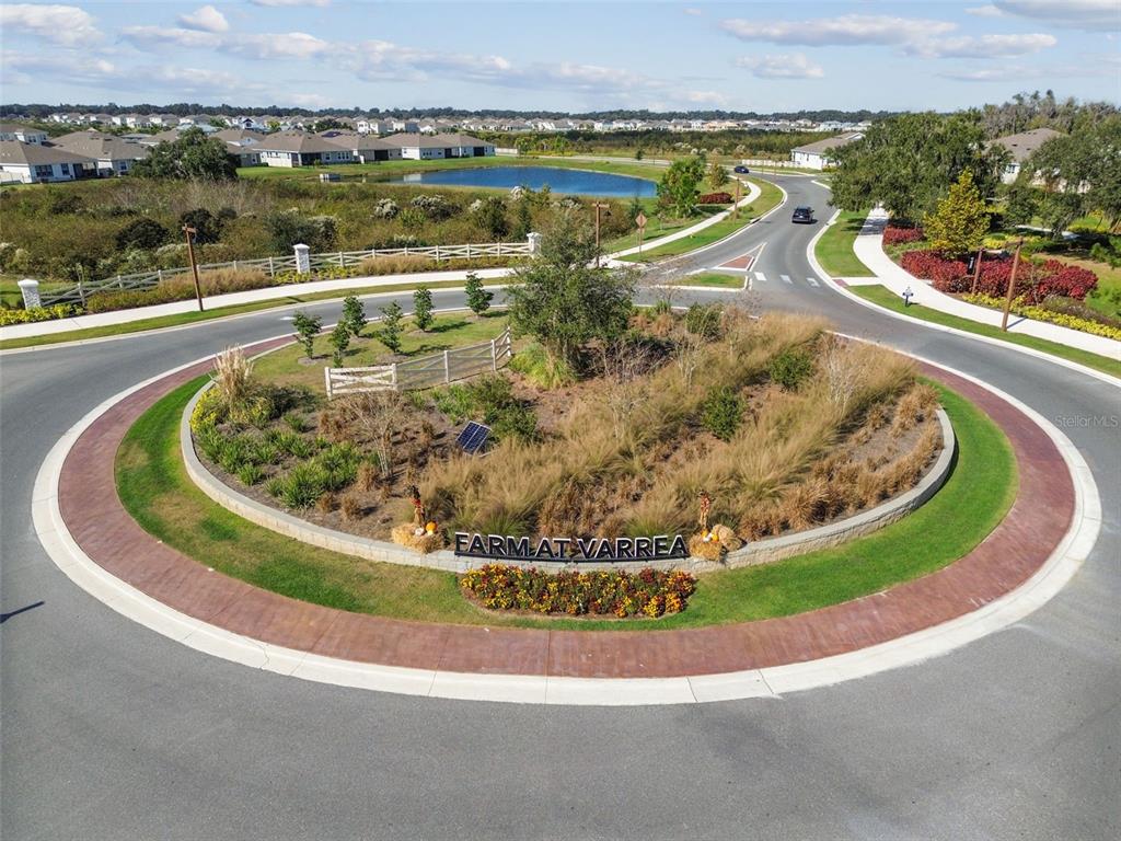 3827 Sunny Spring Street Plant City, FL 33565 - Photo 57 of 57 a view of a swimming pool with a lake