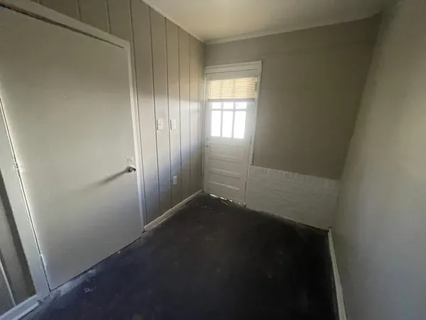 an empty room with windows