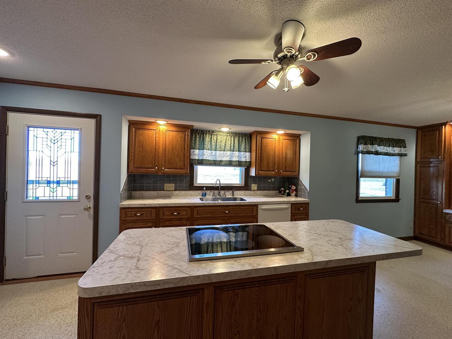 5317 North 1600th Street Newton, IL 62448 - Photo 15 of 63 a kitchen with a stove and a sink