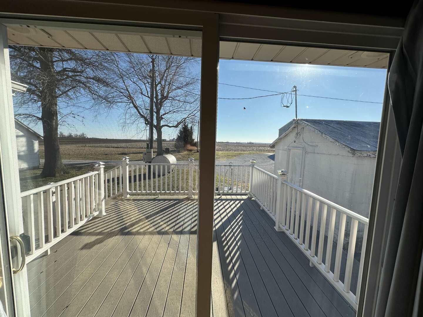 5317 North 1600th Street Newton, IL 62448 - Photo 20 of 63 a view of a balcony with wooden floor