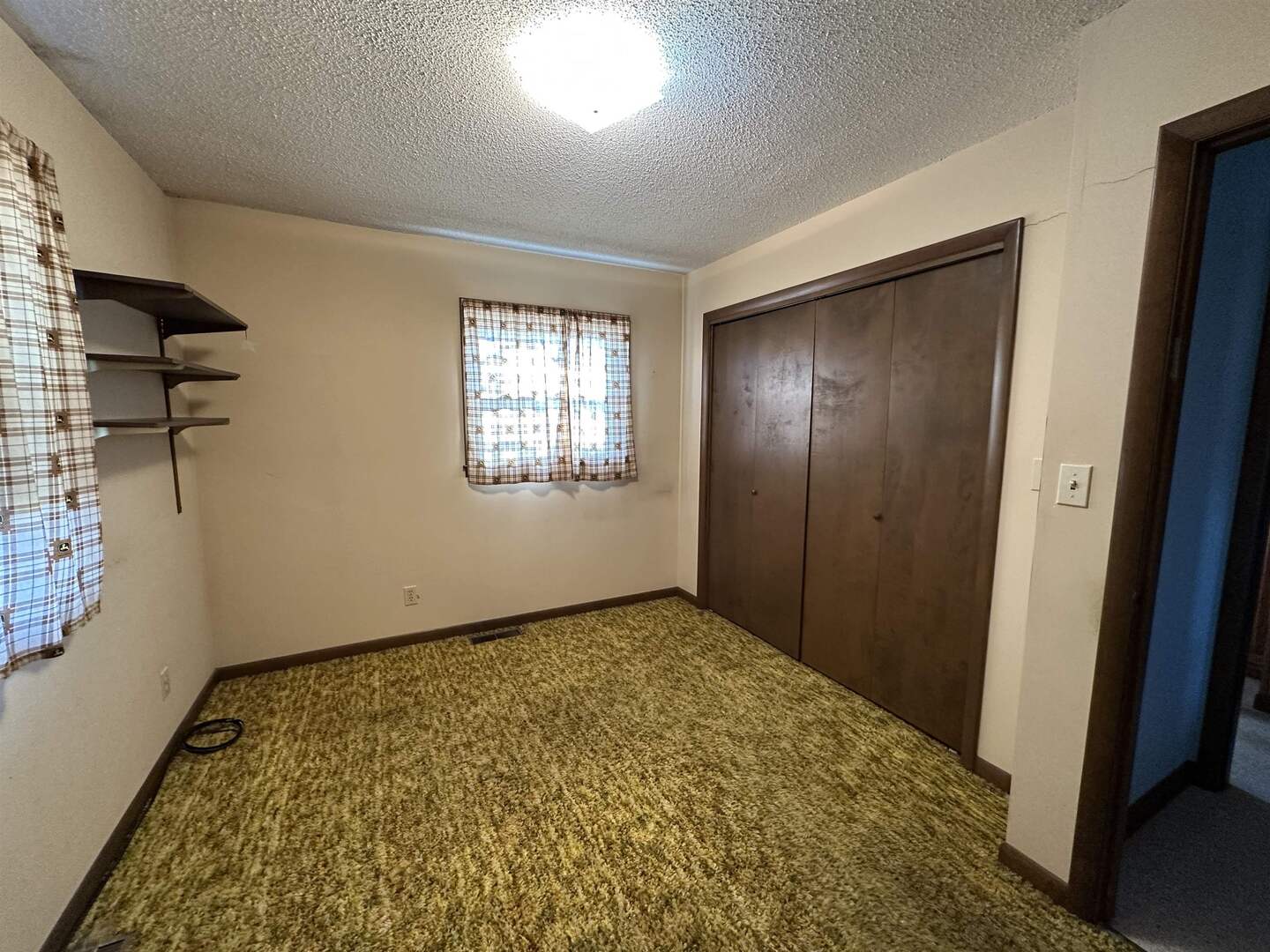 5317 North 1600th Street Newton, IL 62448 - Photo 28 of 63 a view of an empty room and window