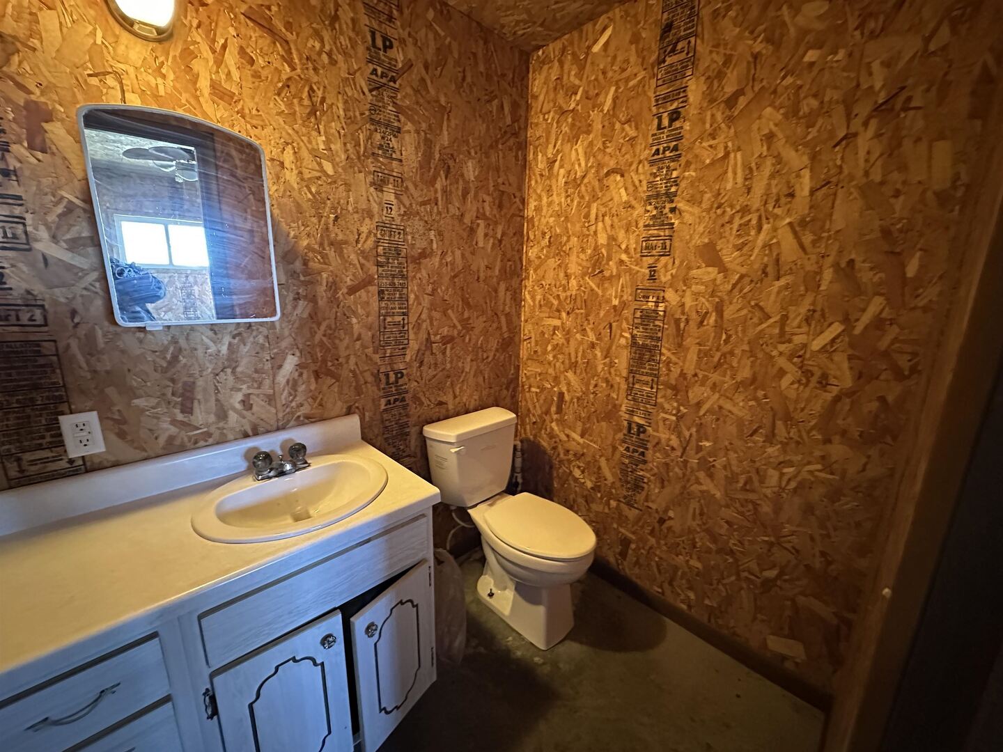 5317 North 1600th Street Newton, IL 62448 - Photo 39 of 63 a bathroom with a sink and a toilet