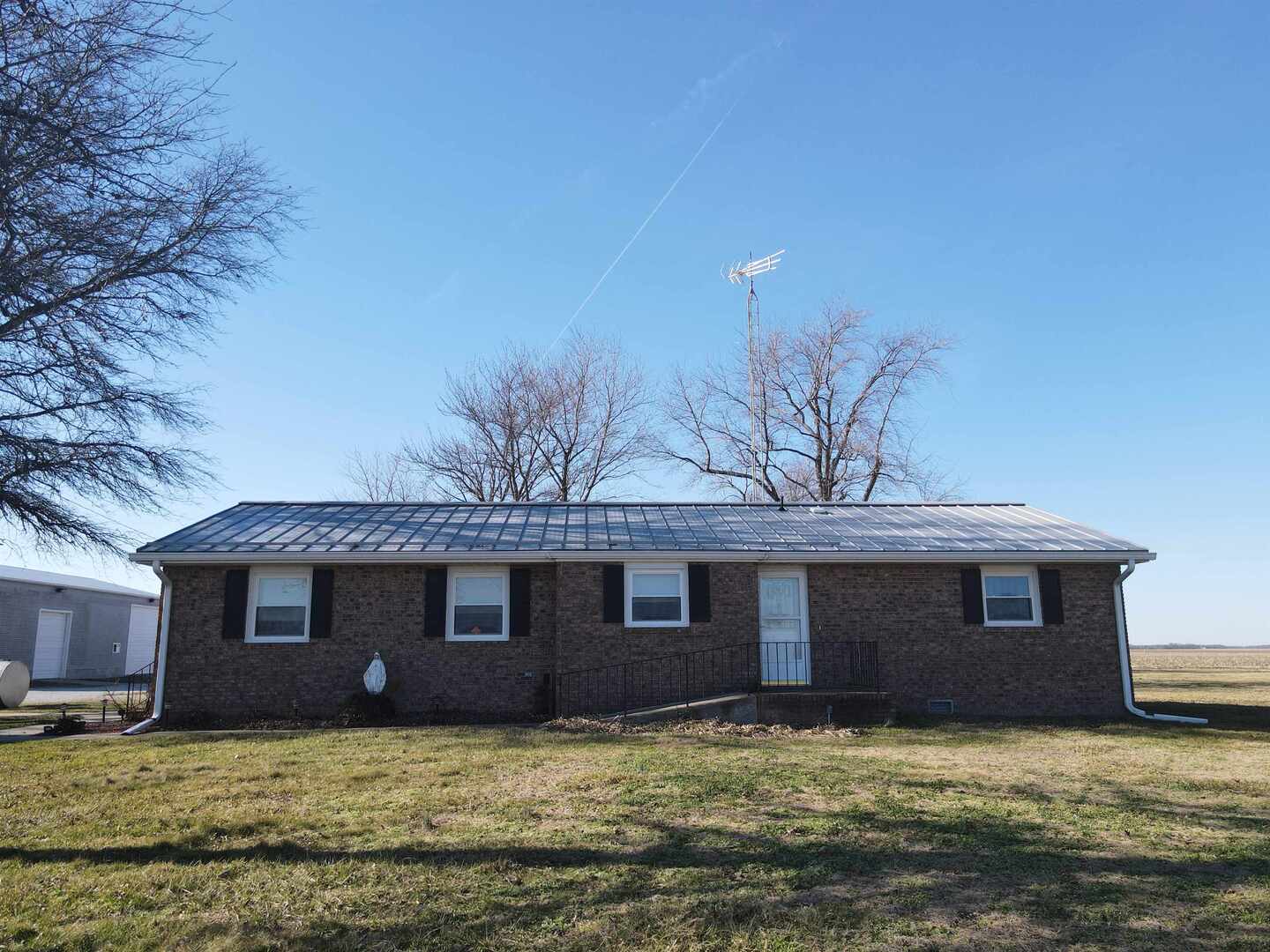 5317 North 1600th Street Newton, IL 62448 - Photo 8 of 63 a view of a house with a yard
