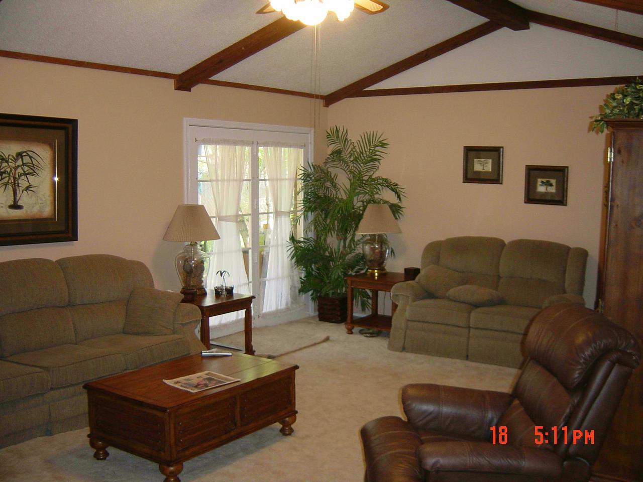 8131 Coronado Trail Amarillo, TX 79110 - Photo 2 of 12 a living room with furniture and a large window