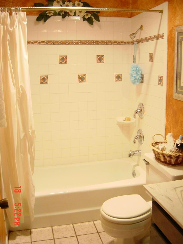 8131 Coronado Trail Amarillo, TX 79110 - Photo 9 of 12 a bathroom with a sink and a mirror