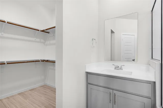 an aerial view of a house with outdoor space