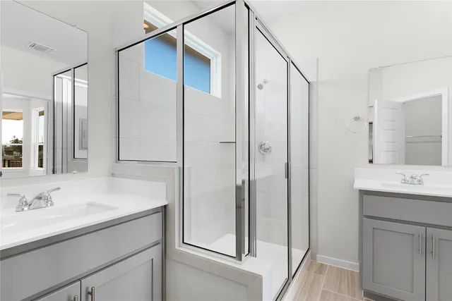 a view of a swimming pool with a patio and a garden