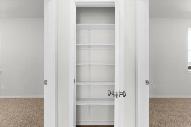 a view of a swimming pool and outdoor seating