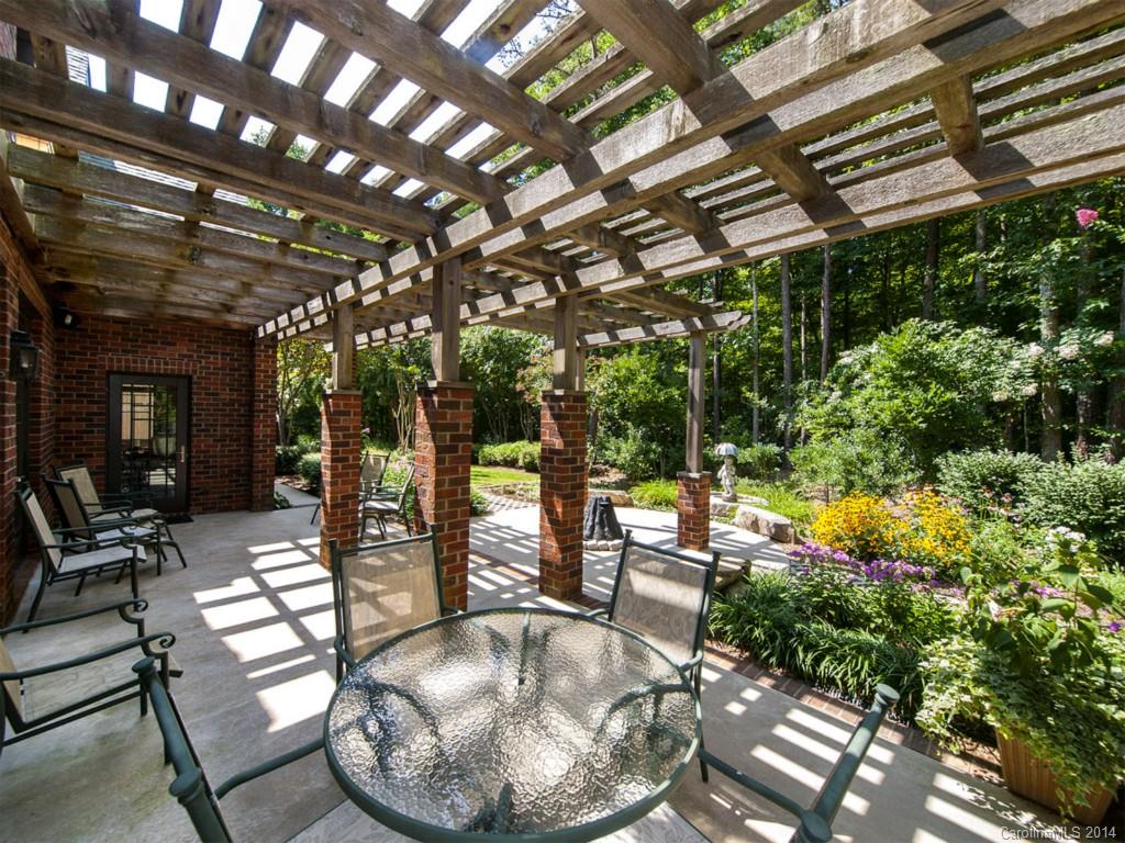 7112 Old Ridge Road Waxhaw, NC 28173 - Photo 22 of 24 a view of swimming pool with outdoor seating and plants