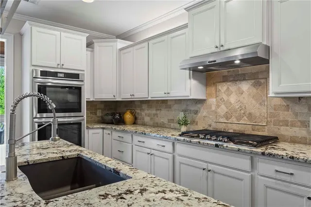 a dining room with furniture and outdoor view