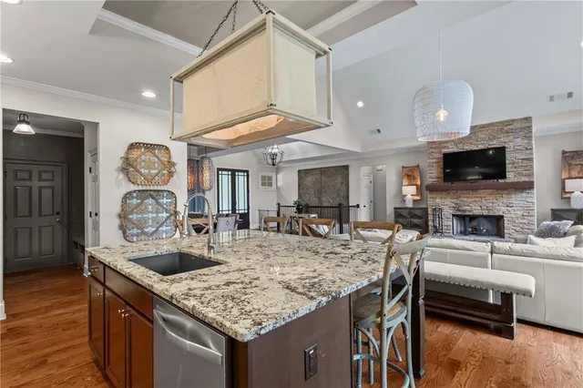 a view of a patio with a table chairs and backyard