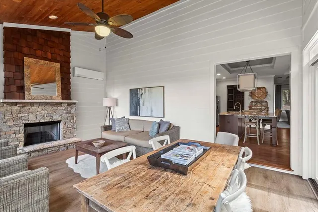 a bedroom with furniture and wooden floor