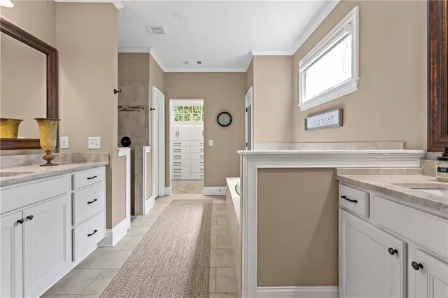 a living room with furniture a fireplace and a table