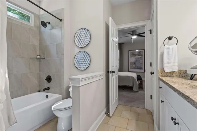 a view of a chairs and table in the backyard