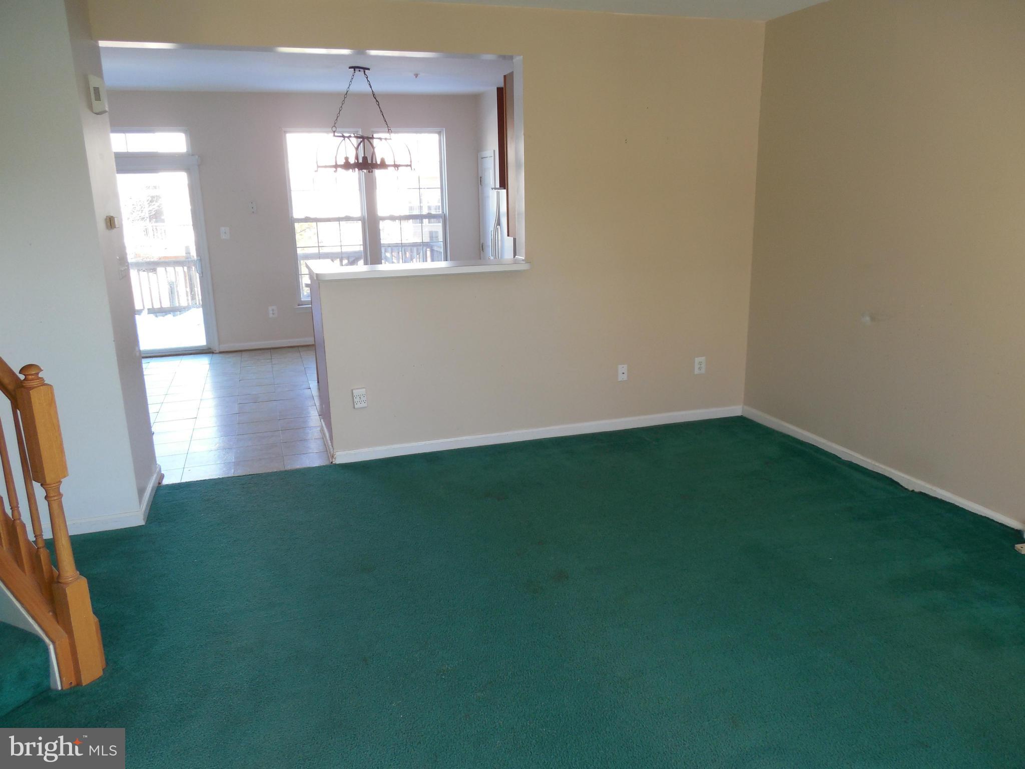 5540 Upshur Square Frederick, MD 21703 - Photo 5 of 8 an empty room with windows