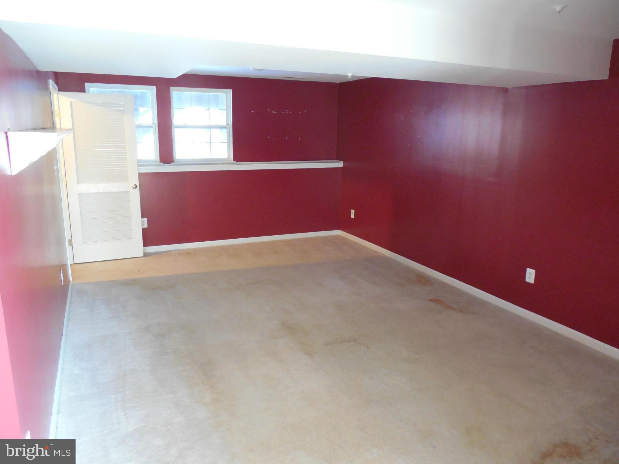 5540 Upshur Square Frederick, MD 21703 - Photo 6 of 8 an empty room with windows
