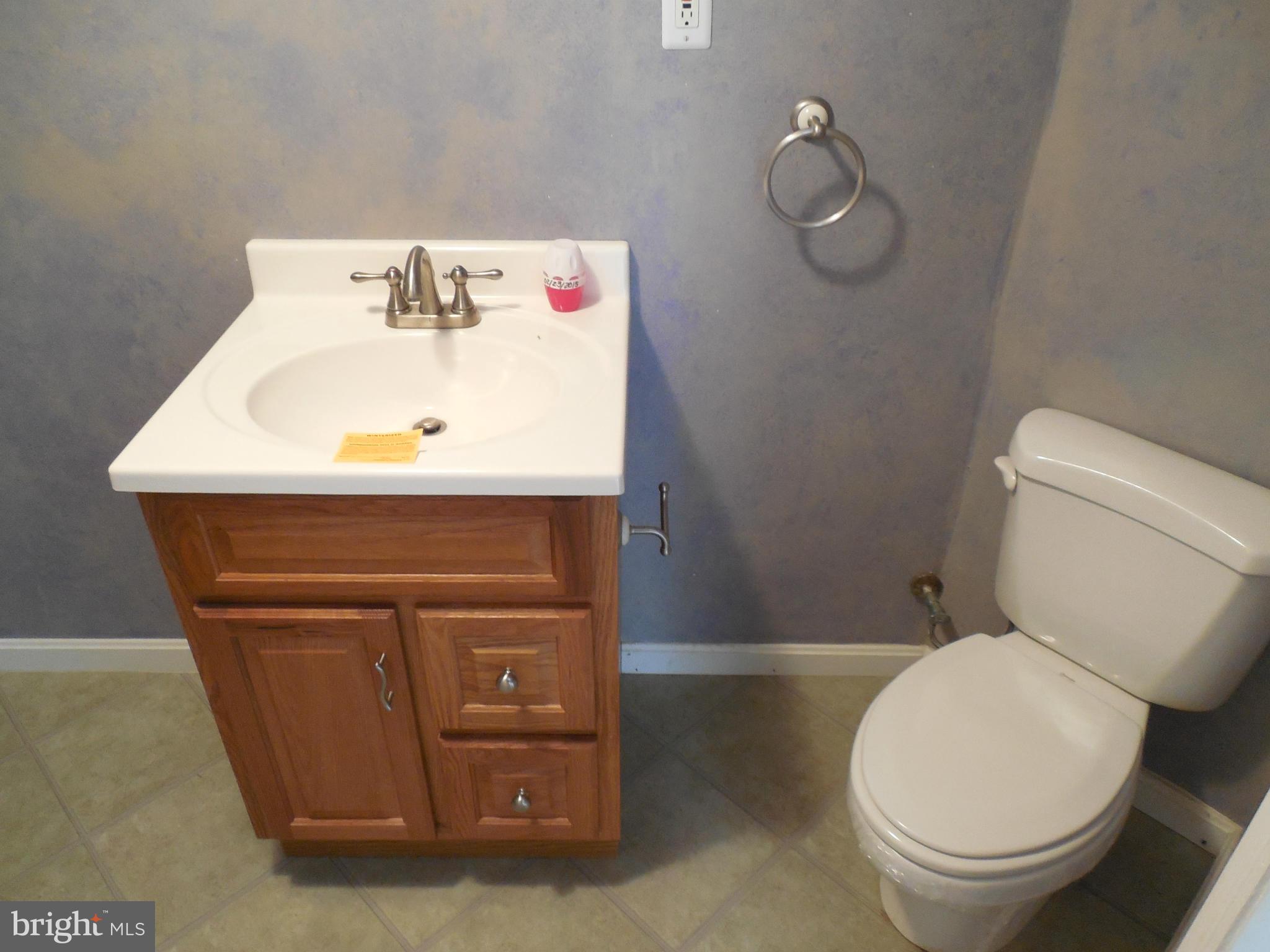 5540 Upshur Square Frederick, MD 21703 - Photo 7 of 8 a bathroom with a sink and a toilet
