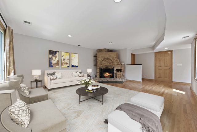 1736 Evergreen Lane Park Ridge, IL 60068 - Photo 11 of 37 a living room with furniture and a fireplace