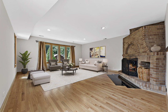 1736 Evergreen Lane Park Ridge, IL 60068 - Photo 12 of 37 a living room with furniture and a fireplace