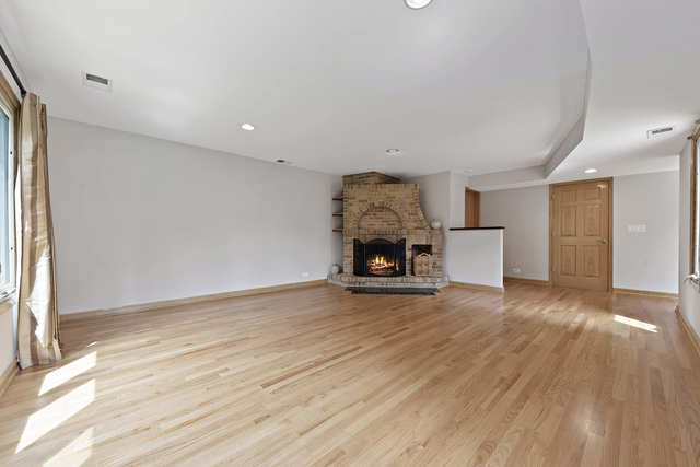 1736 Evergreen Lane Park Ridge, IL 60068 - Photo 13 of 37 a view of a room with wooden floor and furniture
