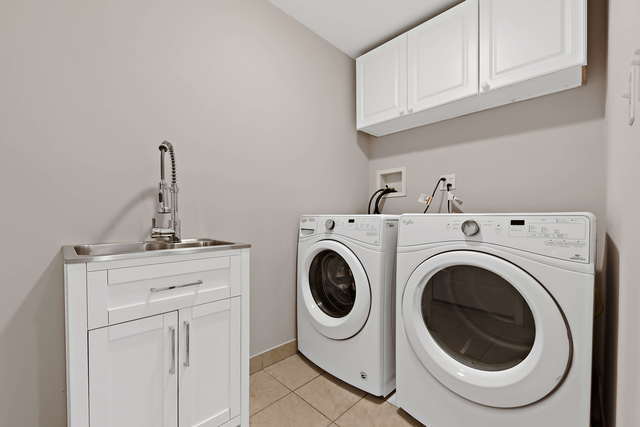 1736 Evergreen Lane Park Ridge, IL 60068 - Photo 29 of 37 a utility room with dryer and washer