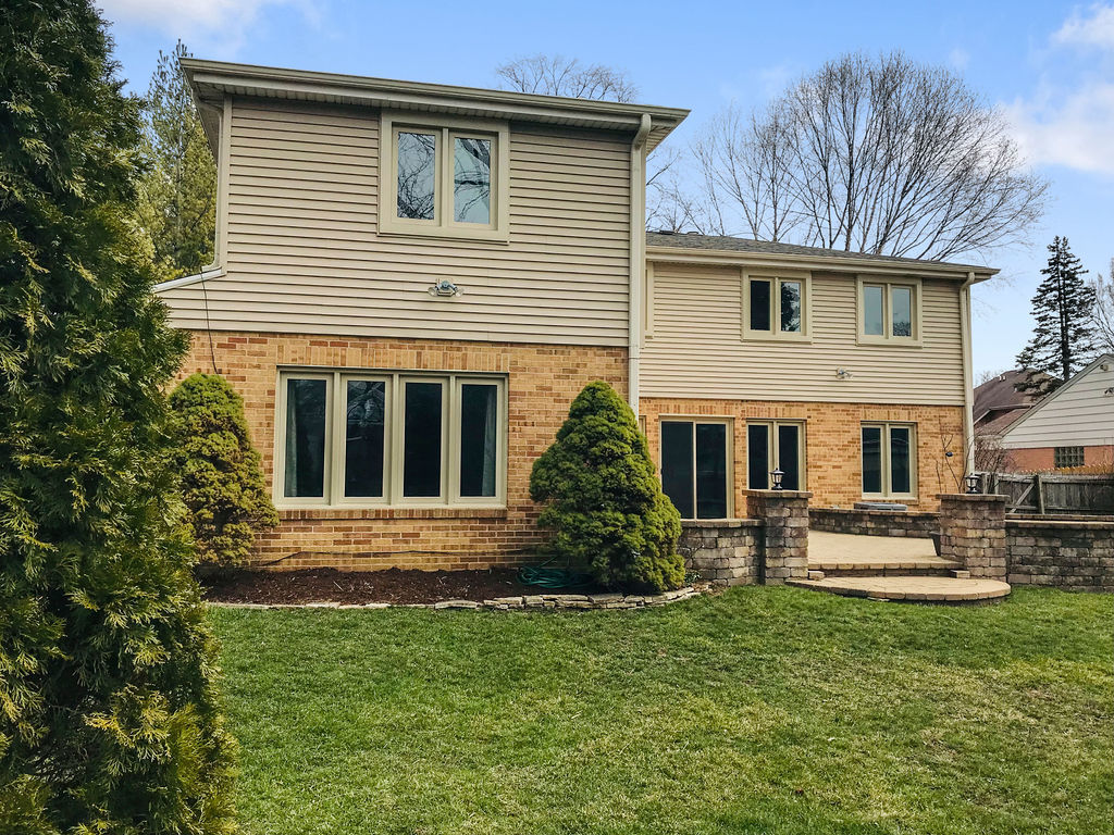 1736 Evergreen Lane Park Ridge, IL 60068 - Photo 32 of 37 a front view of a house with a yard