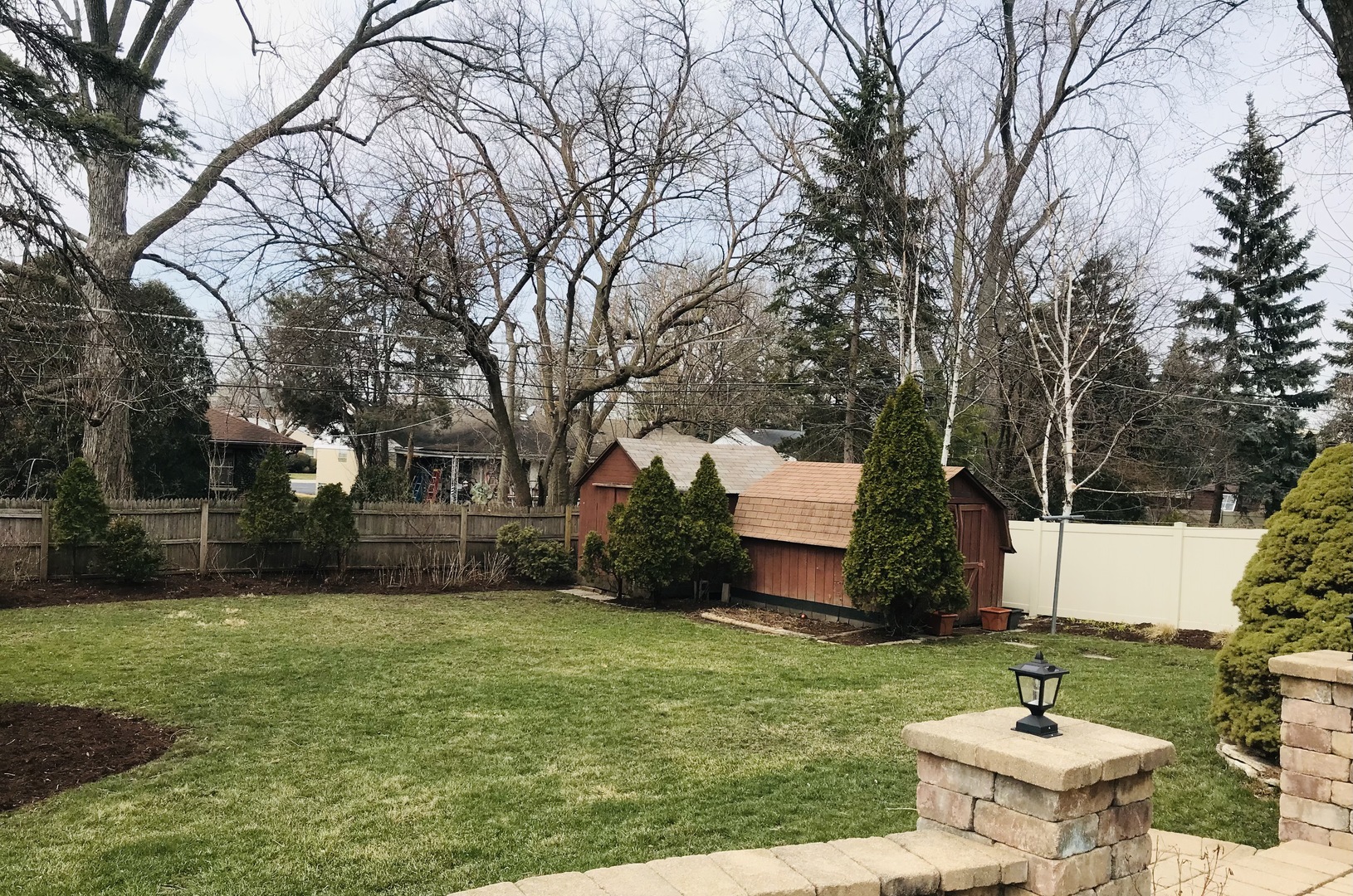 1736 Evergreen Lane Park Ridge, IL 60068 - Photo 34 of 37 a lawn chairs sitting in a yard with large trees