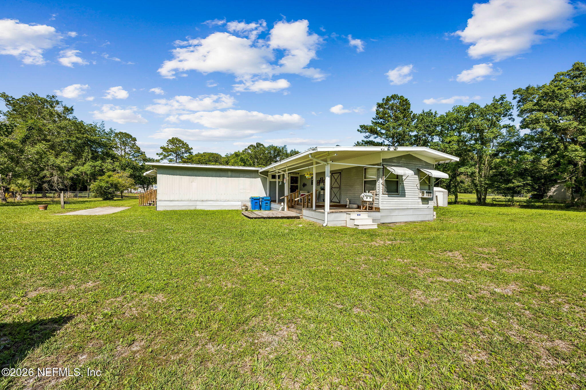 15690 Sears Road Jacksonville, FL 32218 - Photo 19 of 27 a view of a house with a big yard