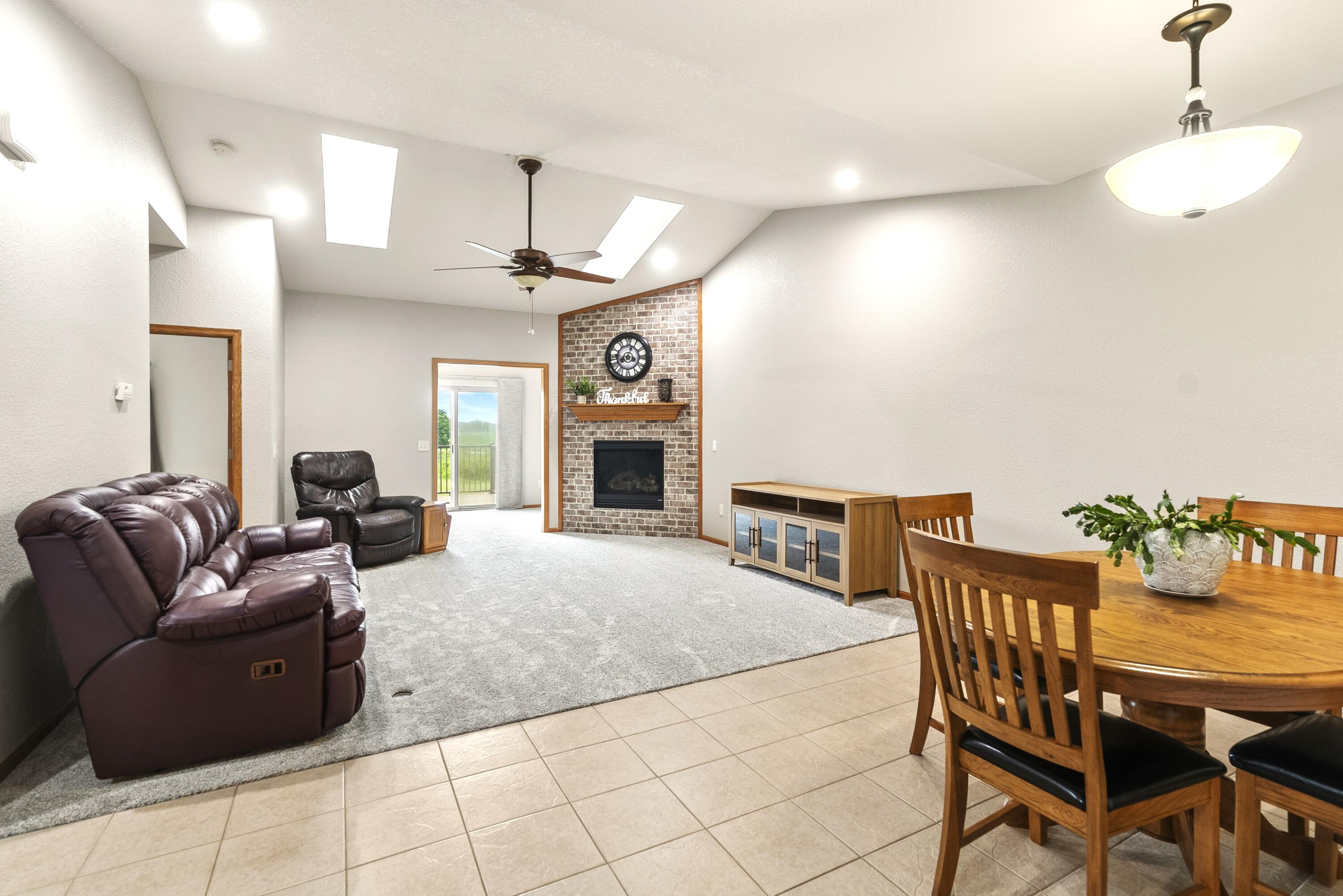 113 Community Drive Fall River, WI 53932 - Photo 11 of 40 Living Room with Skylights