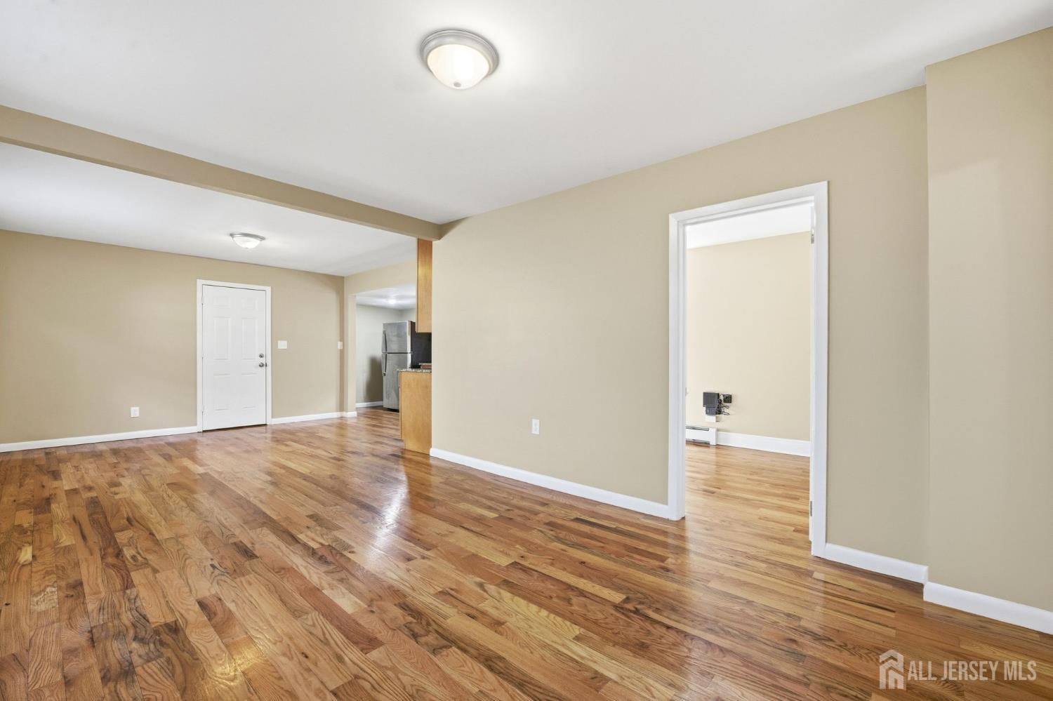 164 South Ridgewood Road, Unit 2 South Orange, NJ 07079 - Photo 2 of 19 a view of empty room with wooden floor