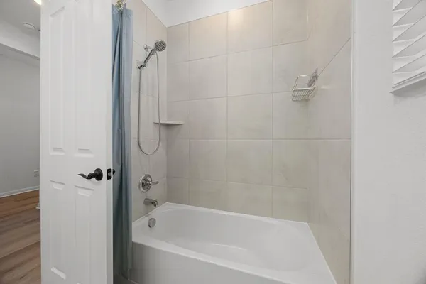 a bathroom with a bathtub