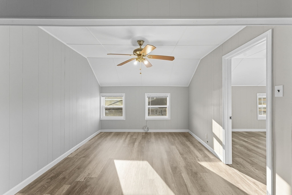 130 Broadway Fall River, MA 02721 - Photo 19 of 42 wooden floor in an empty room with a window