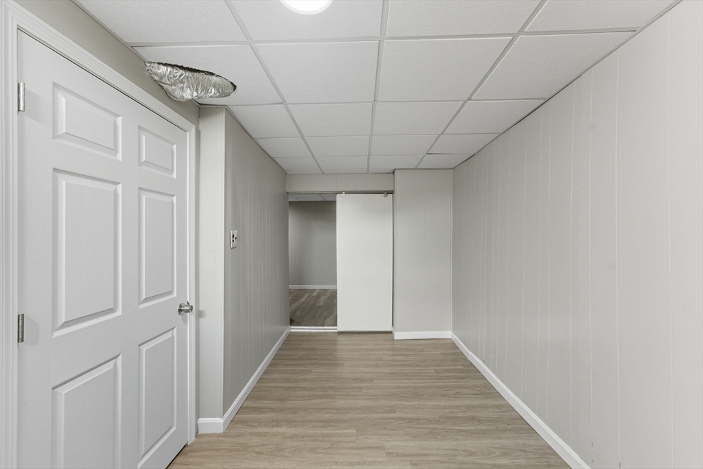 130 Broadway Fall River, MA 02721 - Photo 34 of 42 a view of hallway with wooden floor
