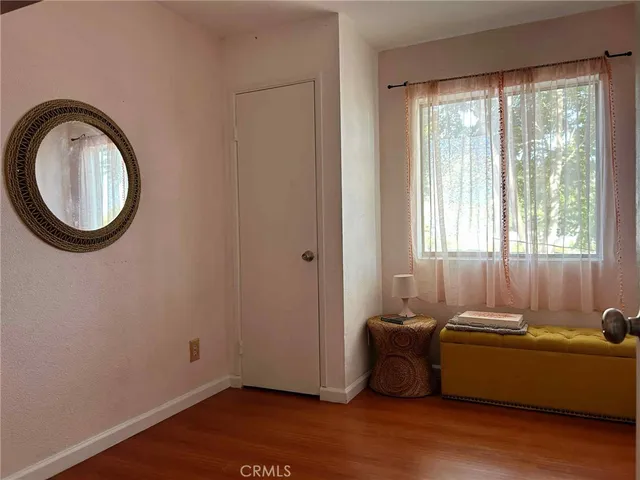 a room with a couch and a window