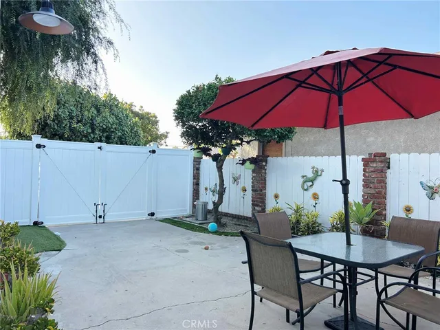 a view of yard with patio