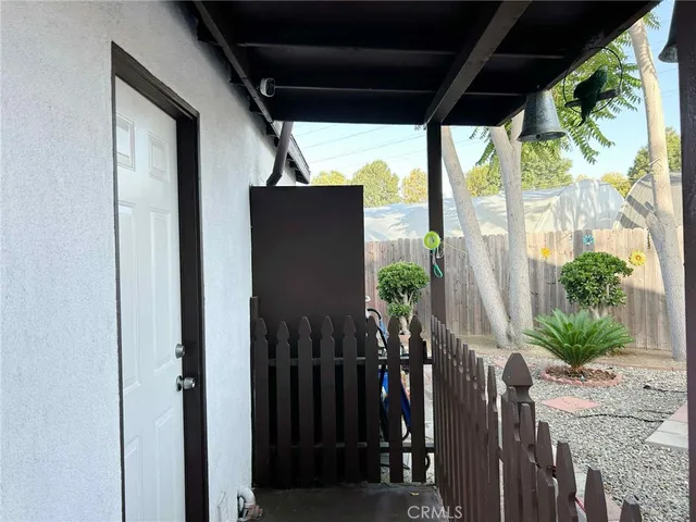 a view of balcony with potted plants
