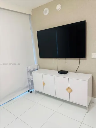 a living room with a tv