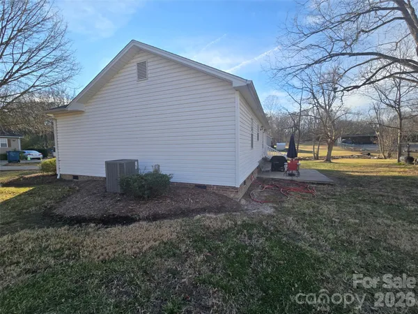 a view of outdoor space with playground and green space