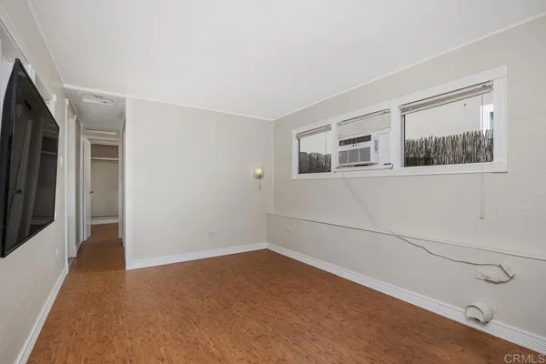 a view of a livingroom with a flat screen tv