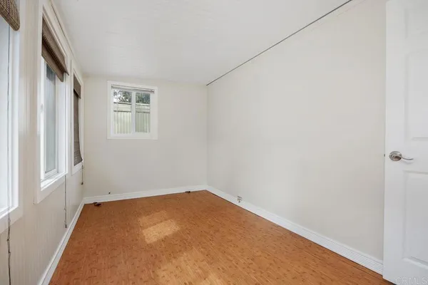 a view of hallway with natural light