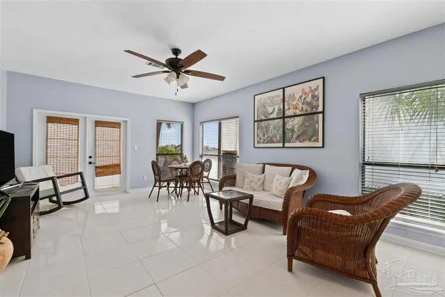 a living room with furniture and a window