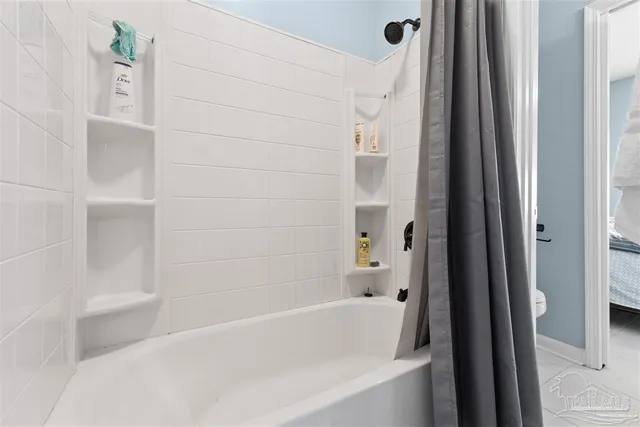 a bathroom with a bathtub