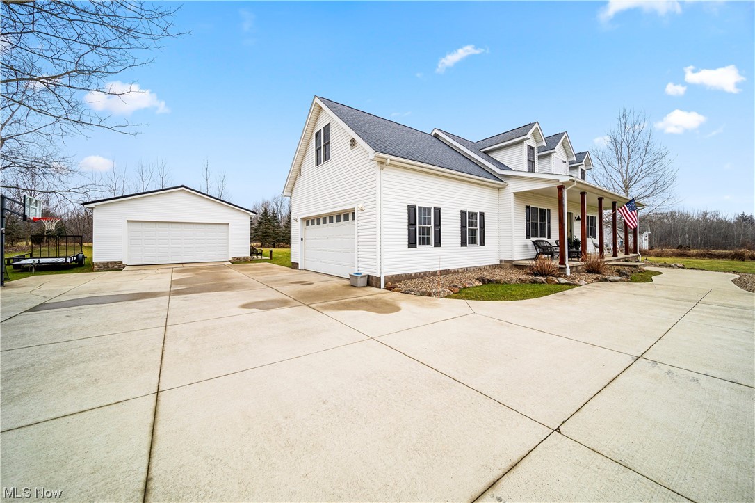 16236 Ravenna Road Burton, OH 44021 - Photo 2 of 29 View of side of home