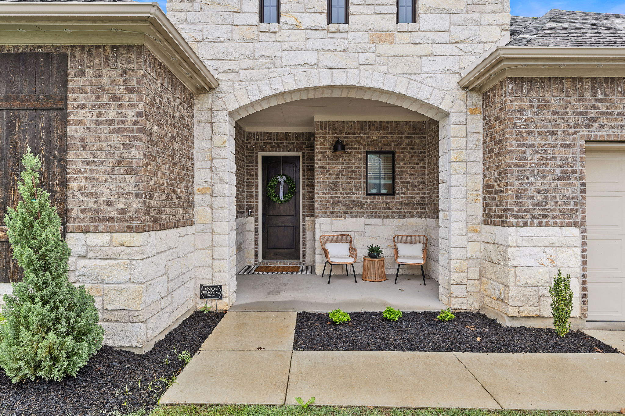 181 Constitution Way Kyle, TX 78640 - Photo 3 of 32 a front view of a house with garden