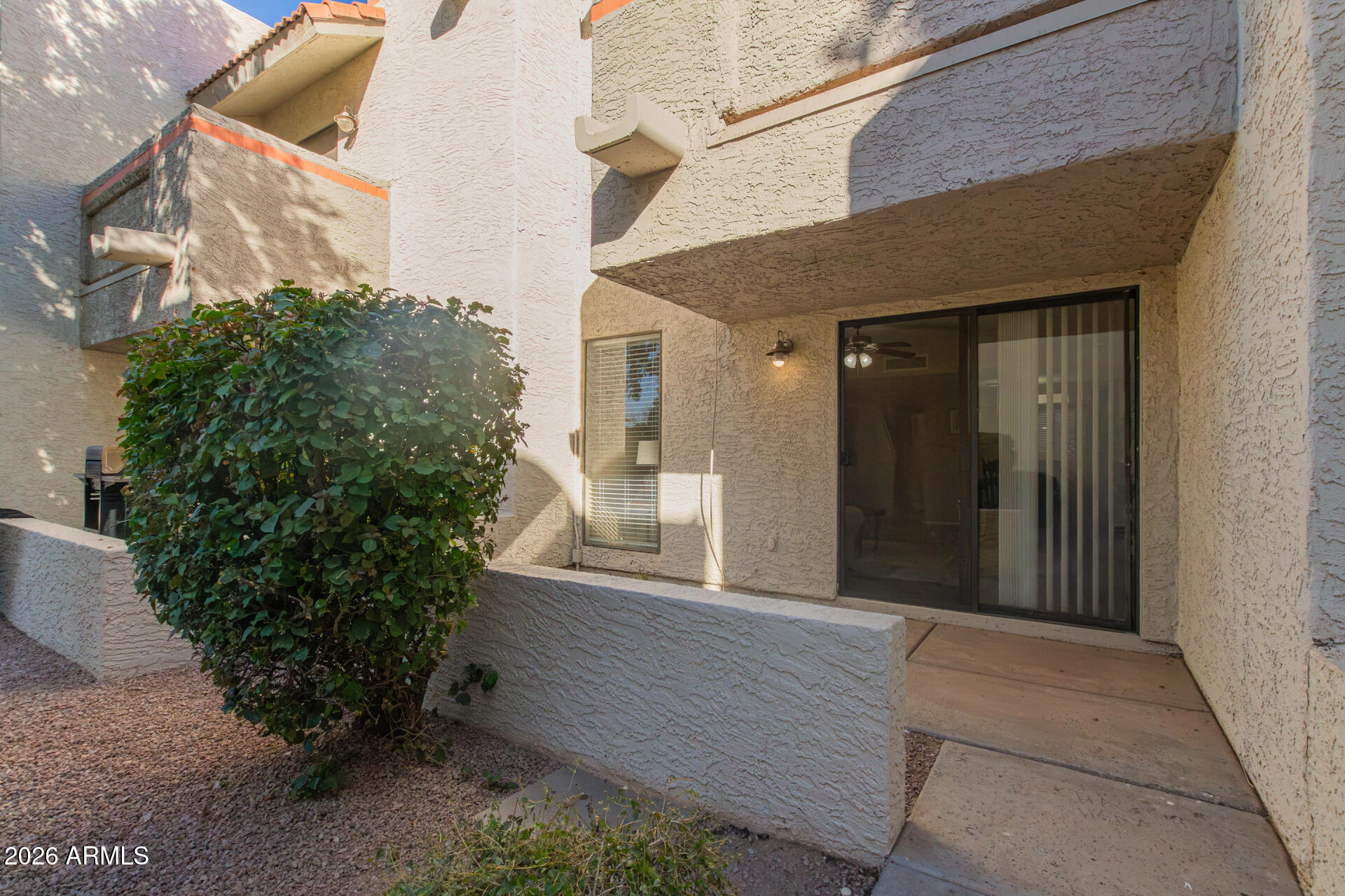 885 North Granite Reef Road, Unit 82 Scottsdale, AZ 85257 - Photo 21 of 32 a view of a house with a yard