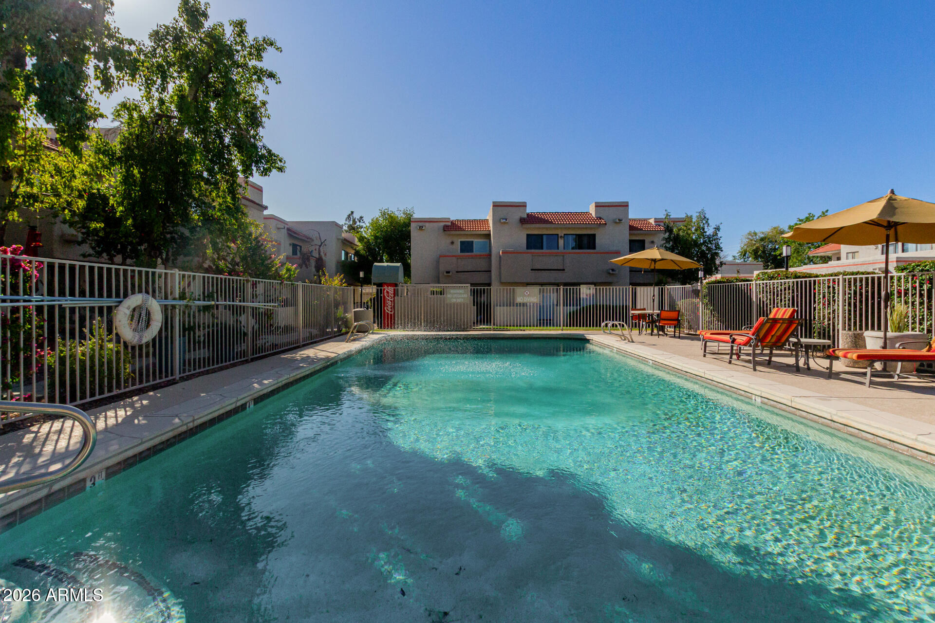 885 North Granite Reef Road, Unit 82 Scottsdale, AZ 85257 - Photo 26 of 32 a view of a garden with wooden fence